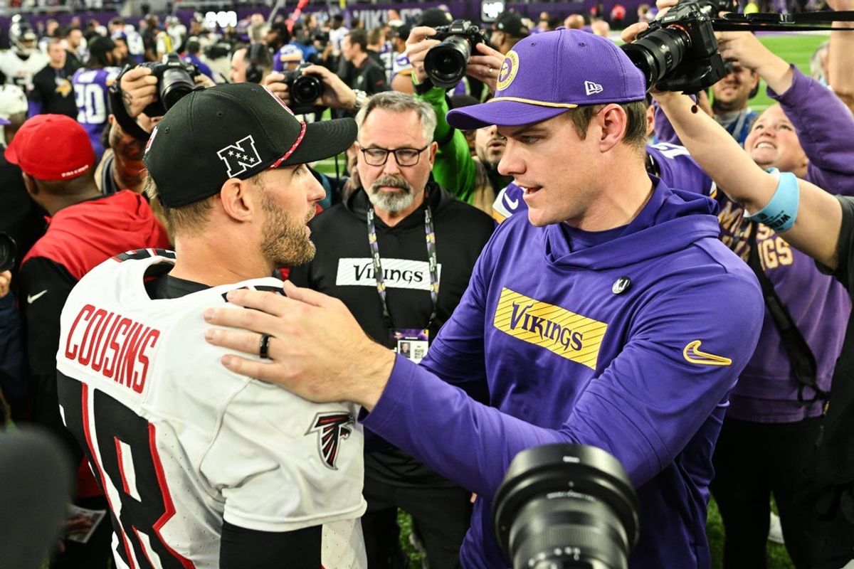 Dec 8, 2024; Minneapolis, Minnesota, USA; Atlanta Falcons quarterback Kirk Cousins (18) and Minnesota Vikings head coach Kevin O'Connell talk after the game at U.S. Bank Stadium. Mandatory Credit: Jeffrey Becker-Imagn Images