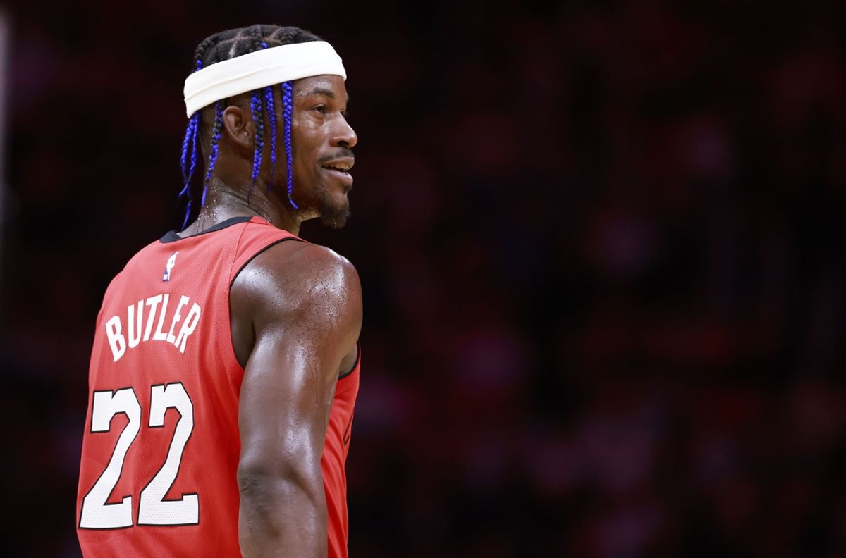 Dec 8, 2024; Miami, Florida, USA;  Miami Heat forward Jimmy Butler (22) smiles at the bench against the Cleveland Cavaliers during the second half at Kaseya Center. Mandatory Credit: Rhona Wise-Imagn Images