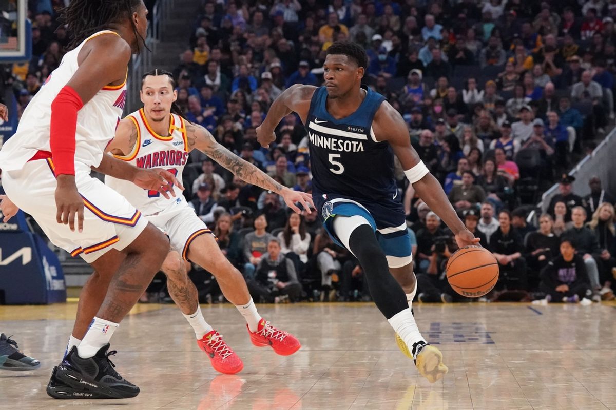 Dec 8, 2024; San Francisco, California, USA;  Minnesota Timberwolves guard Anthony Edwards (5) drives to the basket against Golden State Warriors forward Lindy Waters III (43) in the second period at Chase Center. Mandatory Credit: David Gonzales-Imagn Images