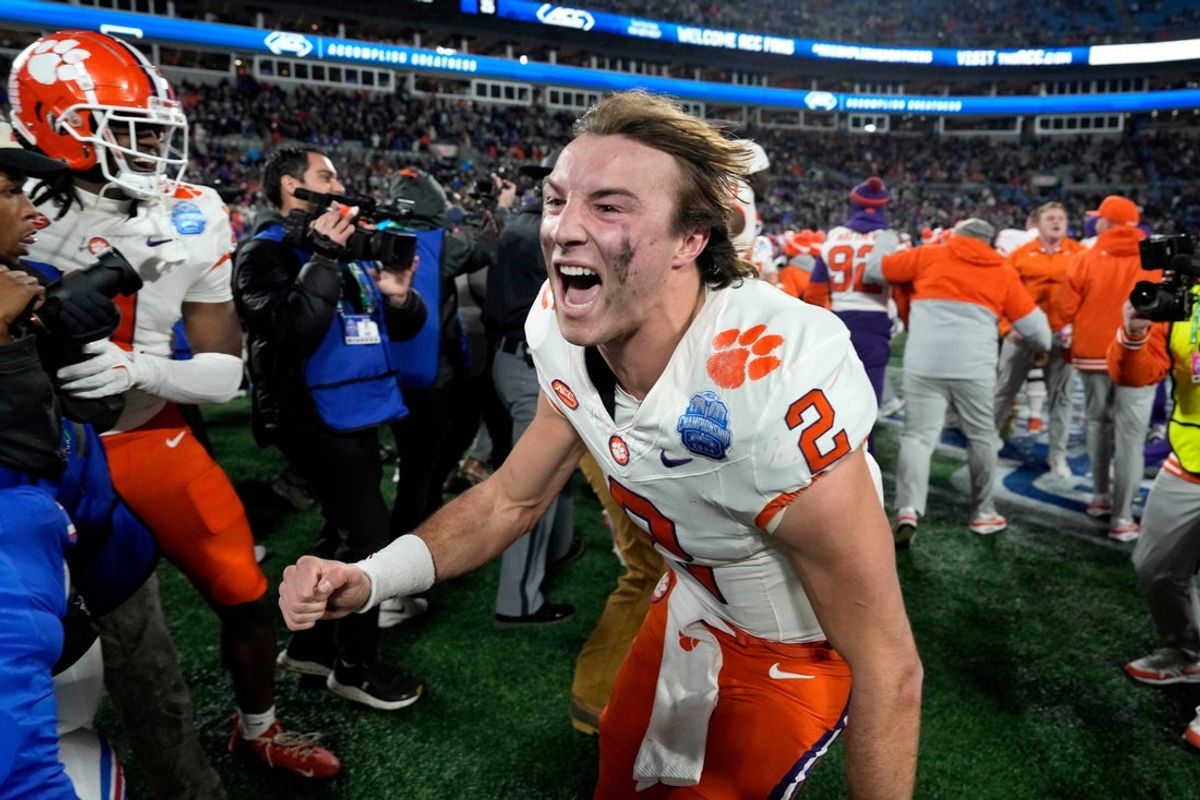 Dec 7, 2024; Charlotte, NC, USA; Clemson Tigers quarterback Cade Klubnik (2) celebrates after winning the 2024 ACC Championship game at Bank of America Stadium. Mandatory Credit: Bob Donnan-Imagn Images