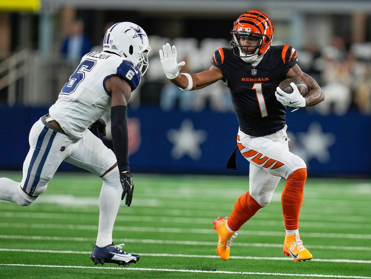 Cincinnati Bengals wide receiver Ja'Marr Chase (1) runs past Dallas Cowboys safety Donovan Wilson (6) in the first quarter during Monday Night Football at AT&T Stadium in Arlington,Texas on Monday, December 9, 2024.