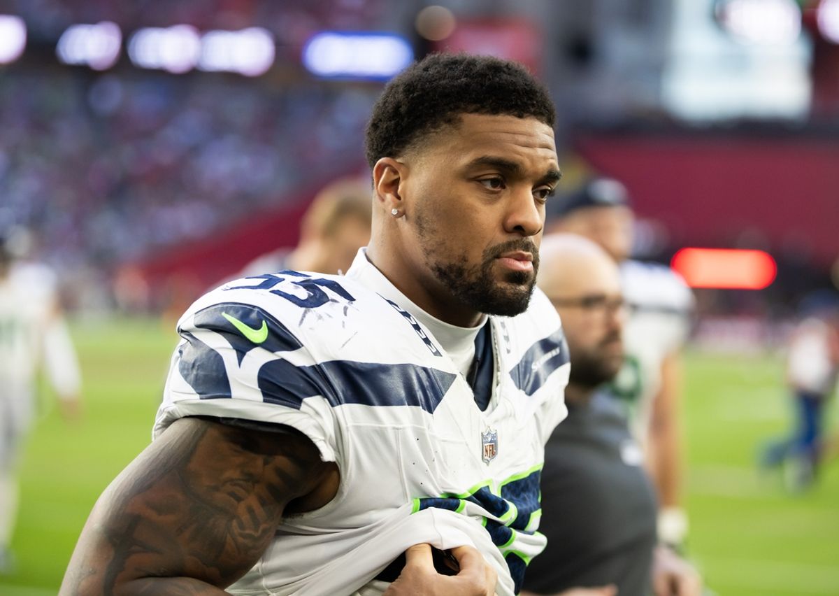 Dec 8, 2024; Glendale, Arizona, USA; Seattle Seahawks defensive end Dre'Mont Jones (55) against the Arizona Cardinals at State Farm Stadium. Mandatory Credit: Mark J. Rebilas-Imagn Images