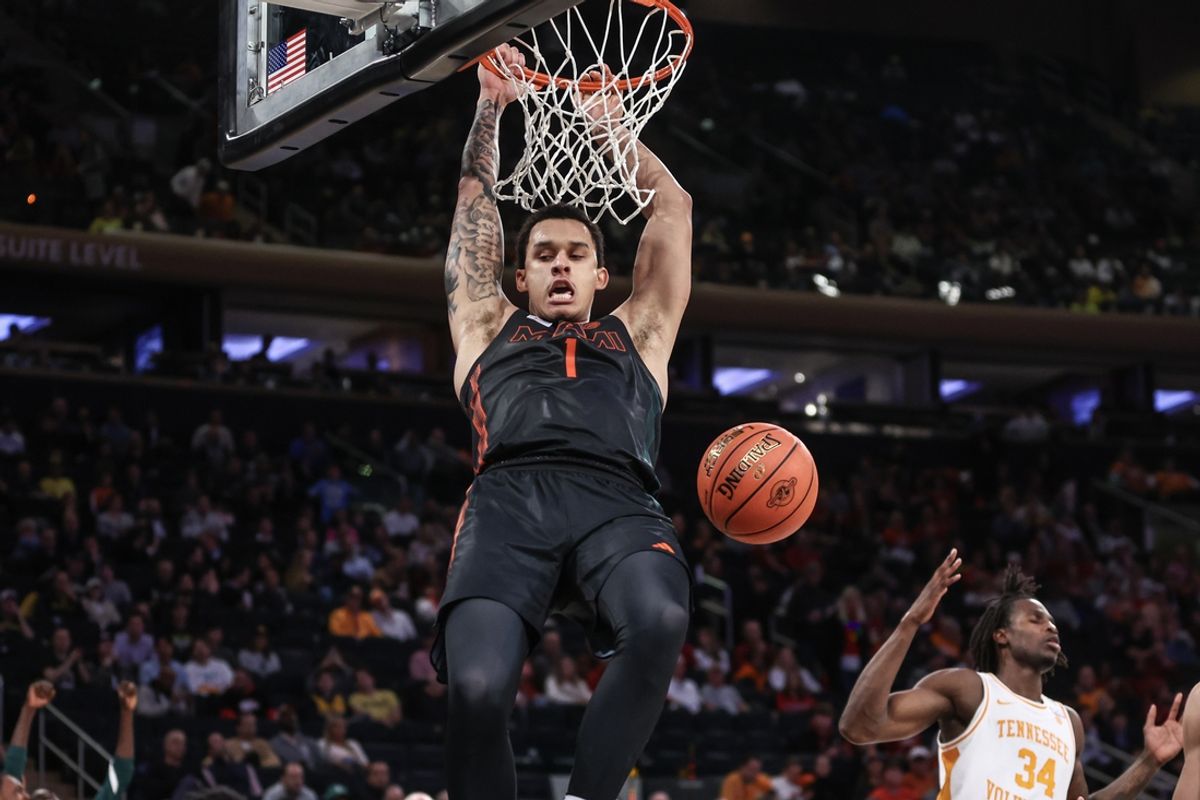 Dec 10, 2024; New York, New York, USA;  Miami  Hurricanes center Lynn Kidd (1) dunks in the second half against the Tennessee Volunteers at Madison Square Garden. Mandatory Credit: Wendell Cruz-Imagn Images