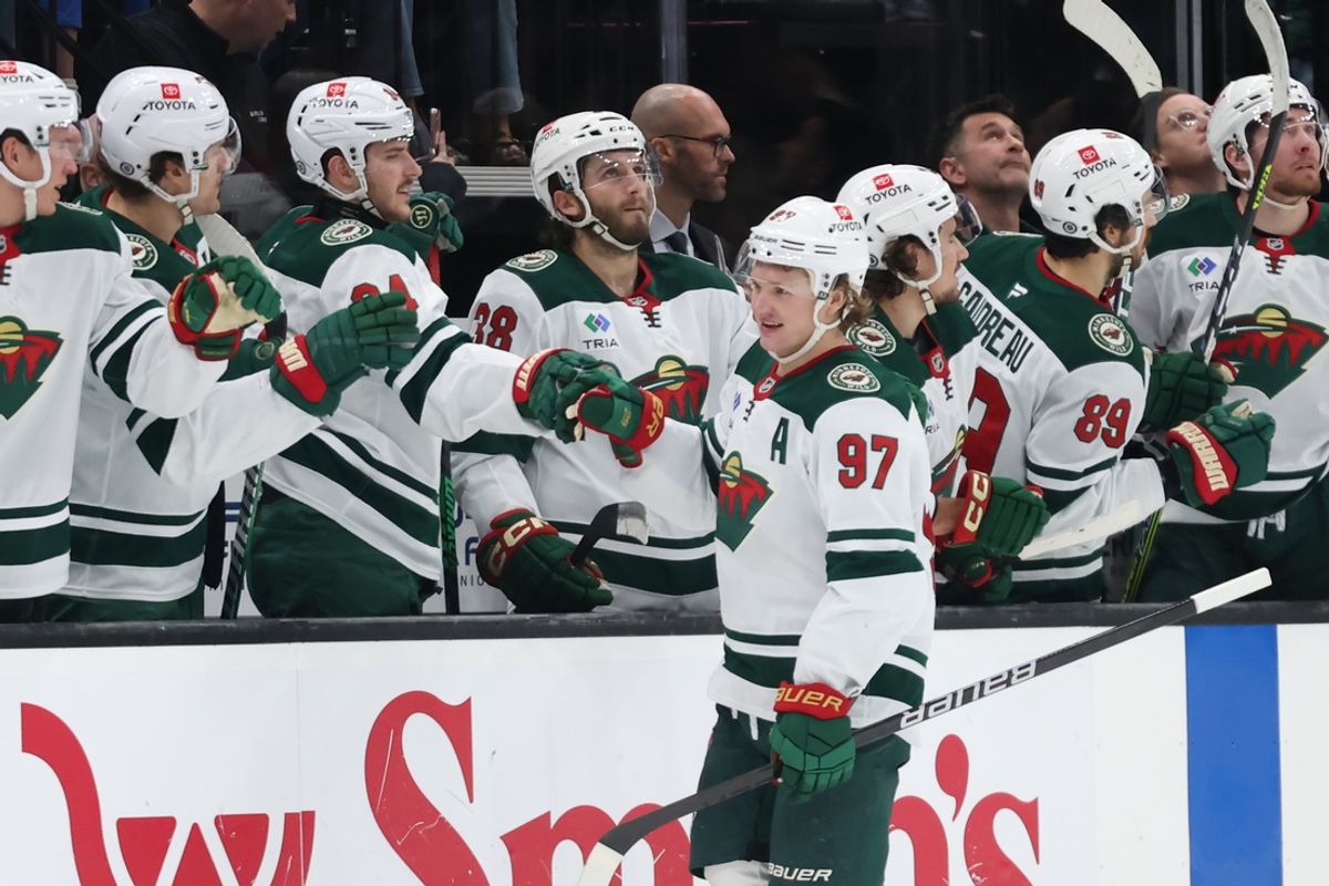 Dec 10, 2024; Salt Lake City, Utah, USA; Minnesota Wild left wing Kirill Kaprizov (97) celebrates a goal with teammates during the second period against the Utah Hockey Club at Delta Center. Mandatory Credit: Rob Gray-Imagn Images
