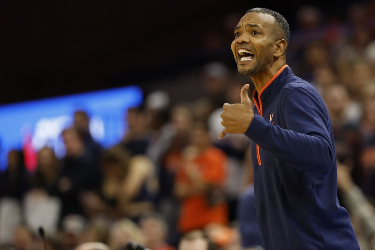 Dec 12, 2024; Charlottesville, Virginia, USA; Virginia Cavaliers head coach Ron Sanchez yells to his team from the bench against the Bethune-Cookman Wildcats in the first half at John Paul Jones Arena. Mandatory Credit: Geoff Burke-Imagn Images
