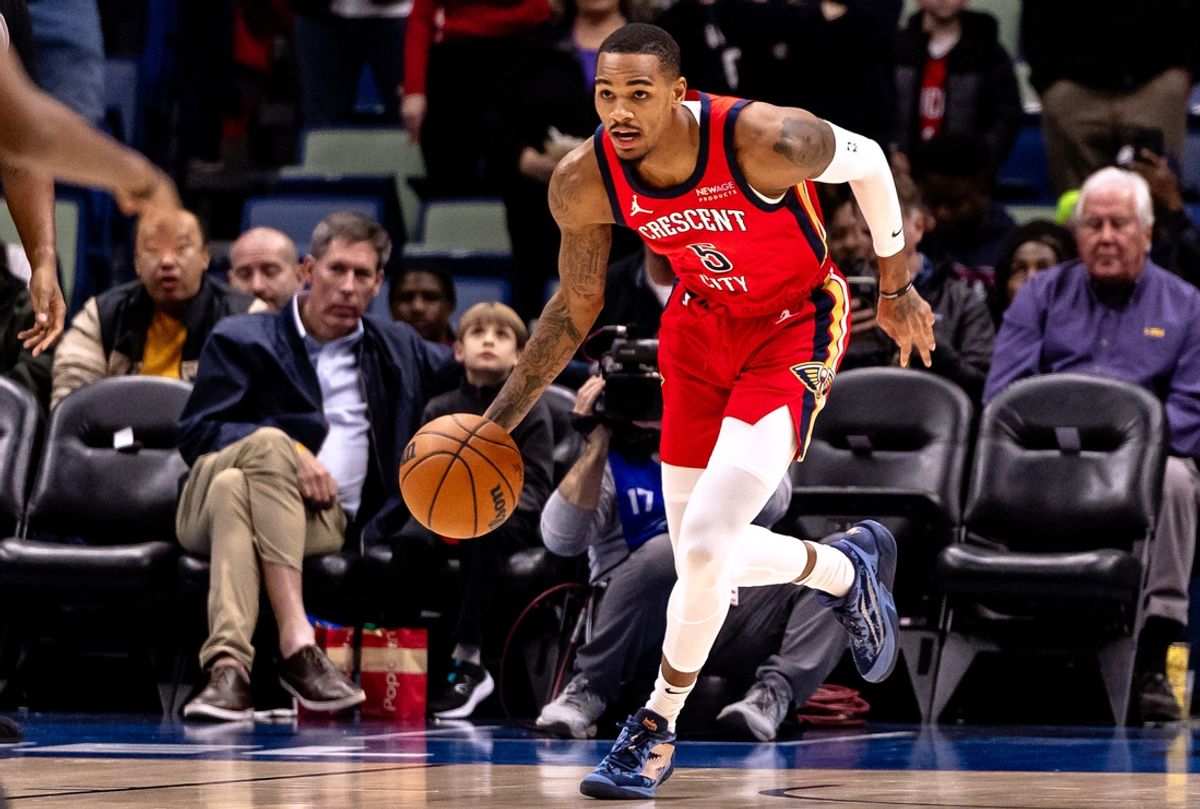 Dec 12, 2024; New Orleans, Louisiana, USA;  New Orleans Pelicans guard Dejounte Murray (5) brings the ball up court against the Sacramento Kings during the first half at Smoothie King Center. Mandatory Credit: Stephen Lew-Imagn Images