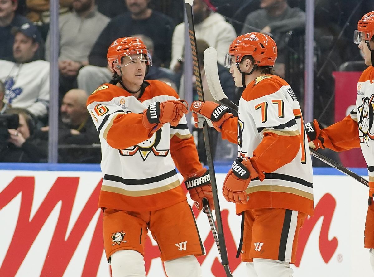 Dec 12, 2024; Toronto, Ontario, CAN; Anaheim Ducks forward Ryan Strome (16) congratules forward Frank Vatrano (77) on his goal against the Toronto Maple Leafs during the first period at Scotiabank Arena. Mandatory Credit: John E. Sokolowski-Imagn Images