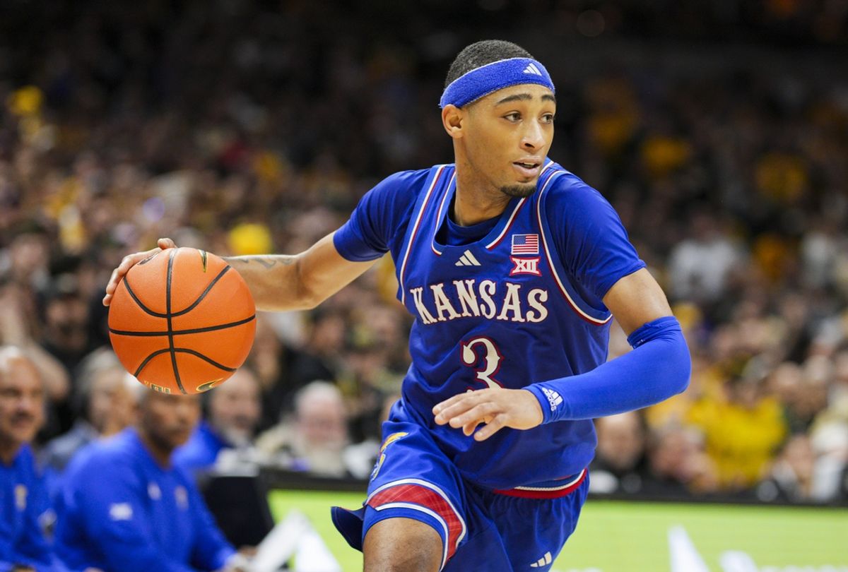 Dec 8, 2024; Columbia, Missouri, USA; Kansas Jayhawks guard Dajuan Harris Jr. (3) dribbles the ball during the second half against the Missouri Tigers at Mizzou Arena. Mandatory Credit: Jay Biggerstaff-Imagn Images