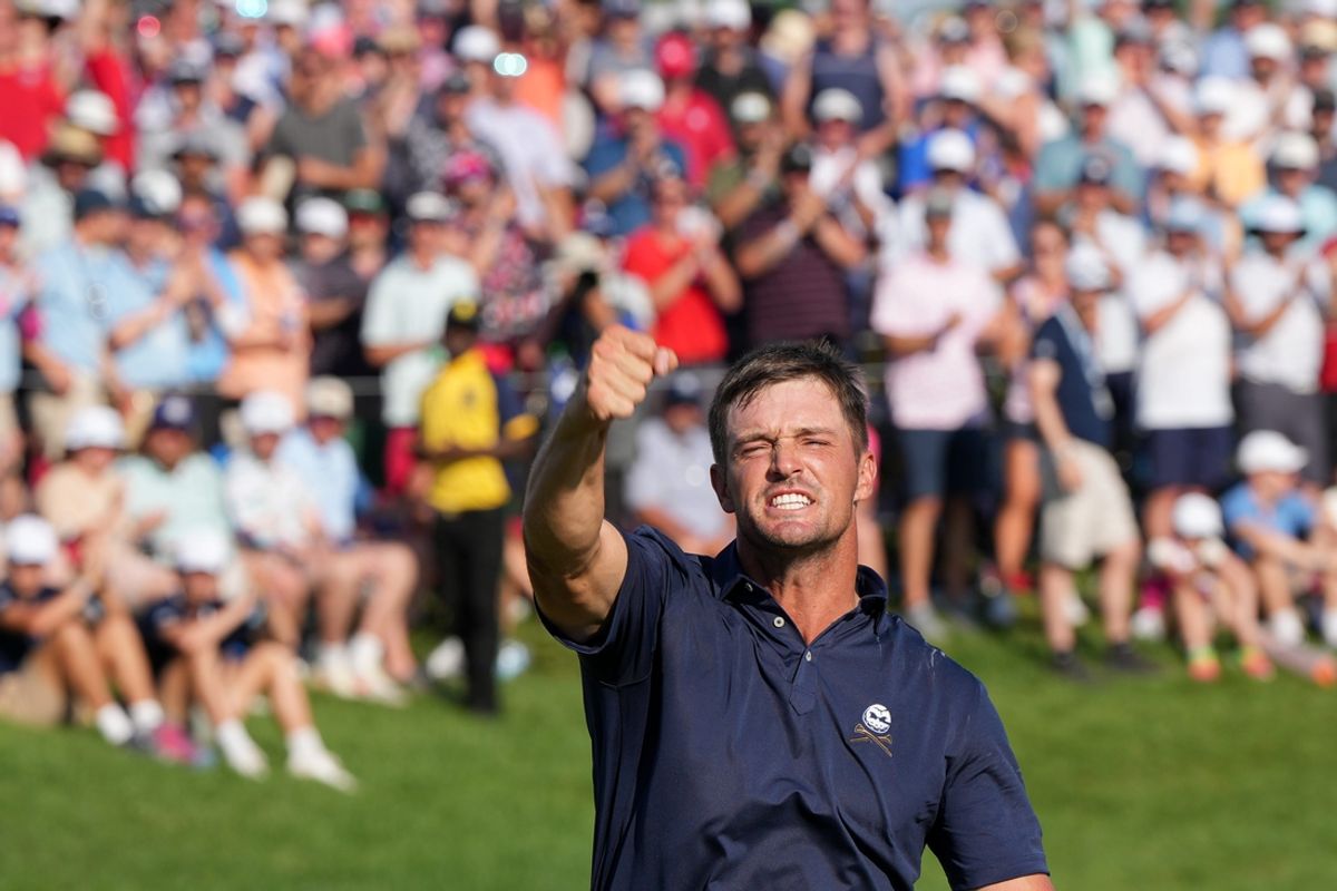 Bryson DeChambeau reacts after putting on the 18th green during the final round of the PGA Championship golf tournament at Valhalla Golf Club on Sunday, May 19, 2024.
