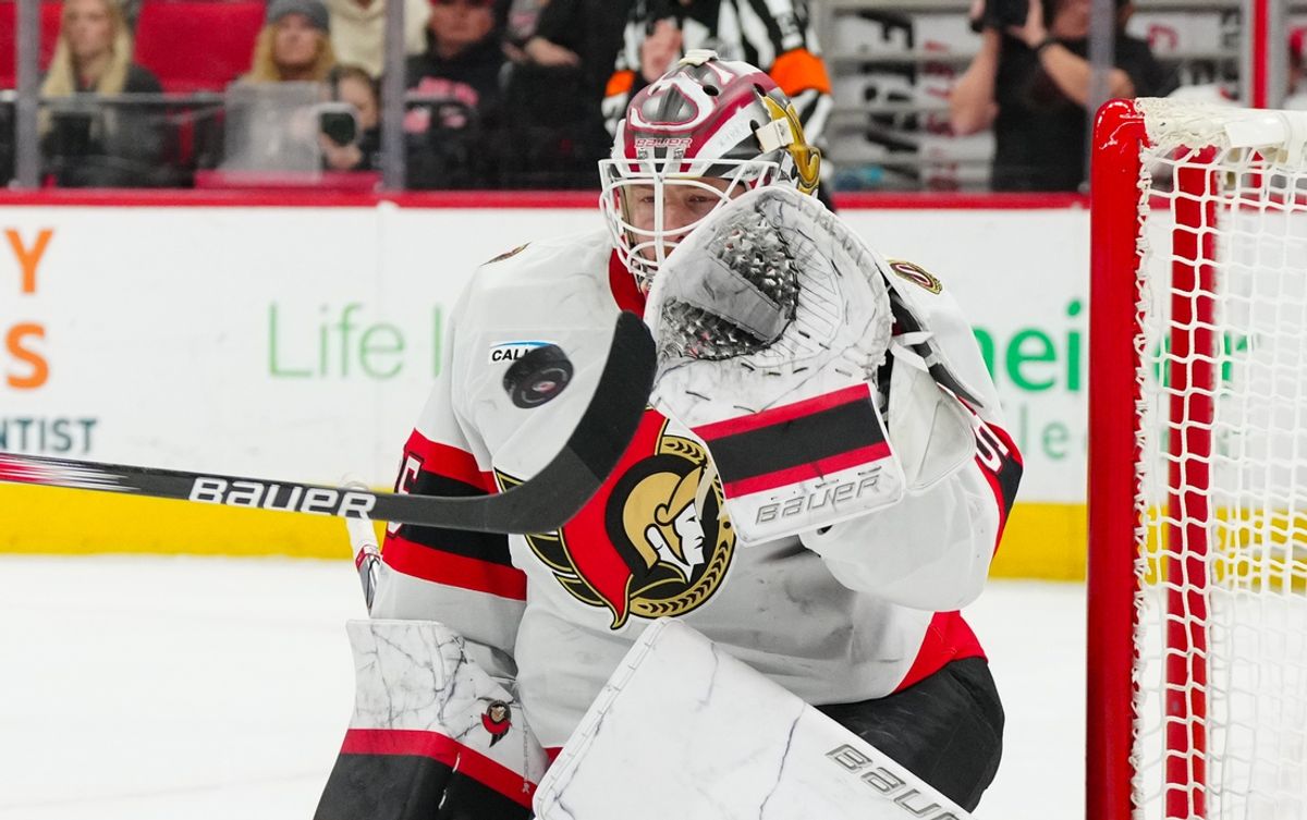 Dec 13, 2024; Raleigh, North Carolina, USA; Ottawa Senators goaltender Linus Ullmark (35) makes a save against the Carolina Hurricanes during the third period at Lenovo Center. Mandatory Credit: James Guillory-Imagn Images