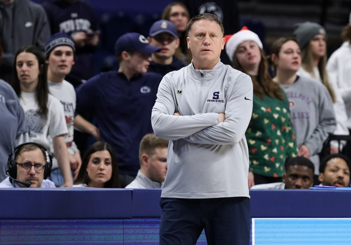 Dec 14, 2024; University Park, Pennsylvania, USA; Penn State Nittany Lions head coach Mike Rhoades looks on from the bench during the first half against the Coppin State Eagles at Bryce Jordan Center. Mandatory Credit: Matthew O'Haren-Imagn Images