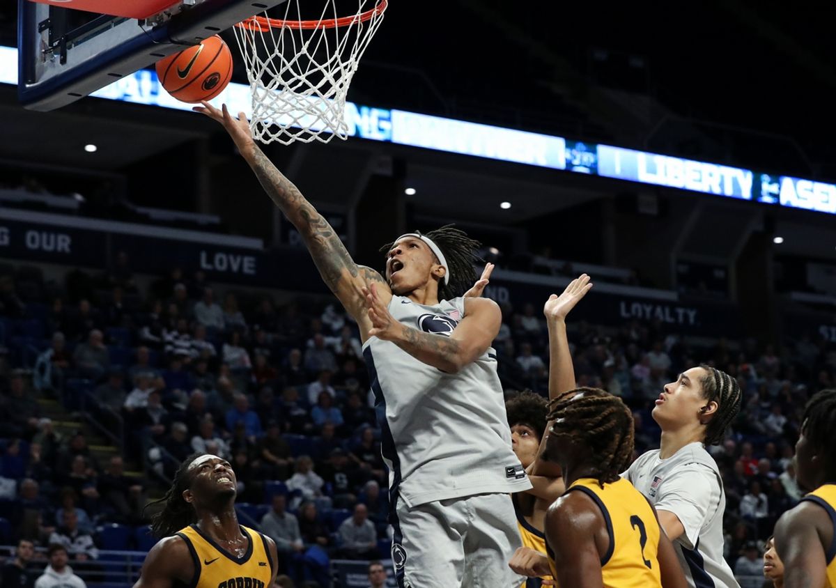 Dec 14, 2024; University Park, Pennsylvania, USA; Penn State Nittany Lions guard Nick Kern Jr (3) drives the ball to the basket against the Coppin State Eagles during the first half at Bryce Jordan Center. Penn State won 99-51. Mandatory Credit: Matthew O'Haren-Imagn Images