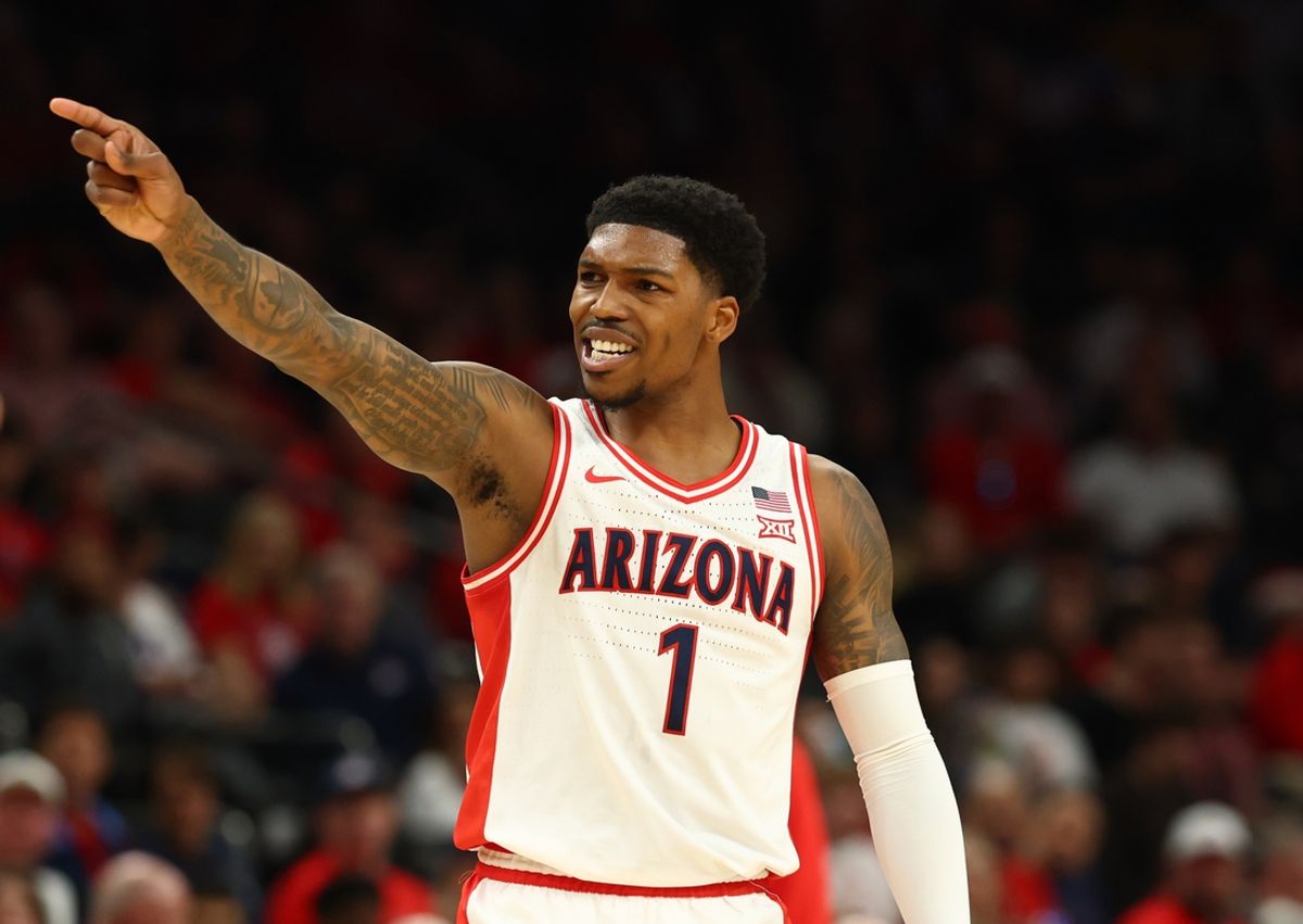 Dec 14, 2024; Phoenix, Arizona, USA; Arizona Wildcats guard Caleb Love (1) against the UCLA Bruins in the first half at Footprint Center. Mandatory Credit: Mark J. Rebilas-Imagn Images
