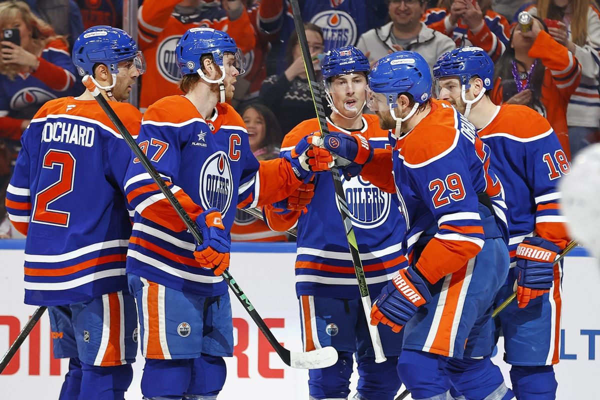 Dec 14, 2024; Edmonton, Alberta, CAN; The Edmonton Oilers celebrate a goal scored by forward Ryan Nugent-Hopkins (93) during the first period against the Vegas Golden Knights at Rogers Place. Mandatory Credit: Perry Nelson-Imagn Images
