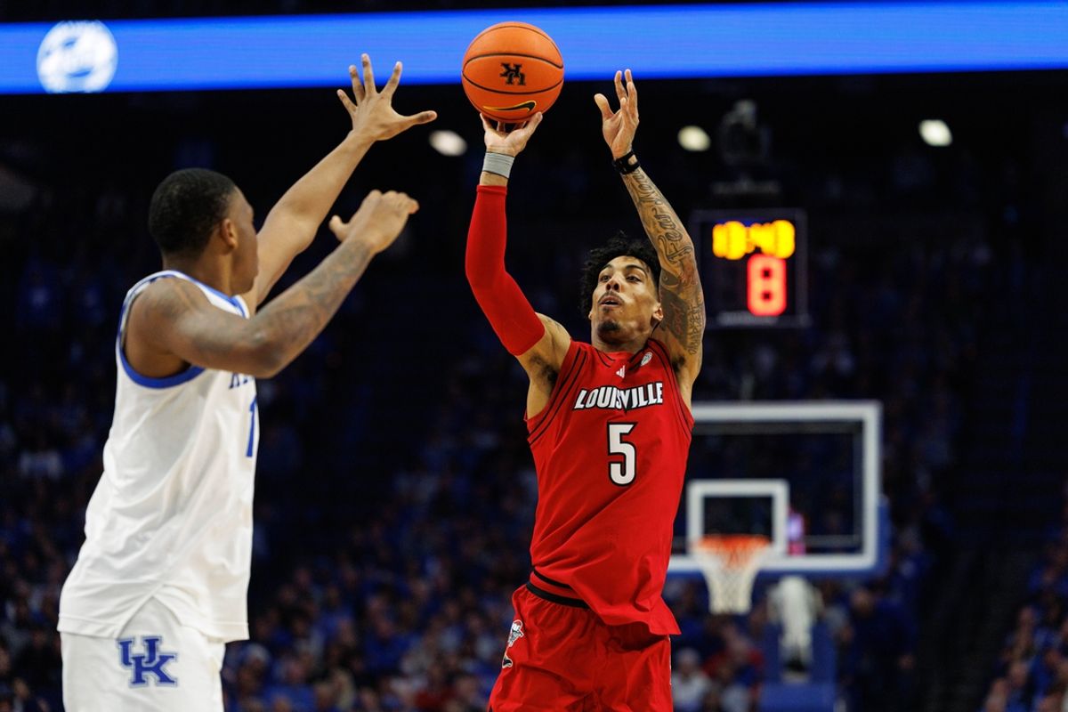 Dec 14, 2024; Lexington, Kentucky, USA; Louisville Cardinals guard Terrence Edwards Jr. (5) shoots the ball during the first half against the Kentucky Wildcats at Rupp Arena at Central Bank Center. Mandatory Credit: Jordan Prather-Imagn Images