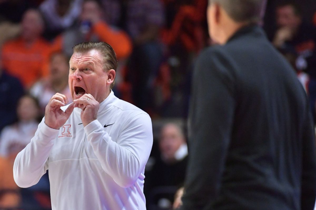 Dec 14, 2024; Champaign, Illinois, USA;  Illinois Fighting Illini head coach Brad Underwood reacts during the first half against the Tennessee Volunteers at State Farm Center. Mandatory Credit: Ron Johnson-Imagn Images