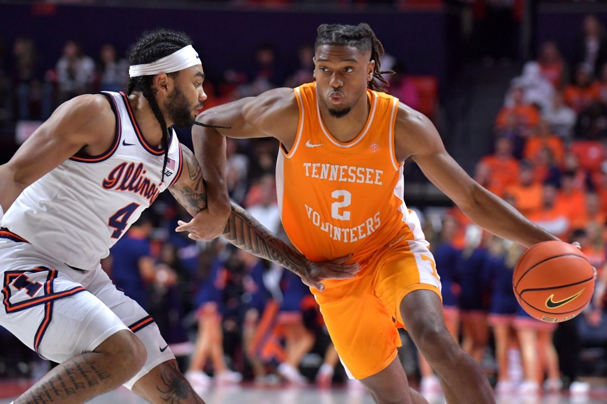 Dec 14, 2024; Champaign, Illinois, USA;  Tennessee Volunteers guard Chaz Lanier (2) drives the ball against Illinois Fighting Illini guard Kylan Boswell (4) during the second half at State Farm Center. Mandatory Credit: Ron Johnson-Imagn Images