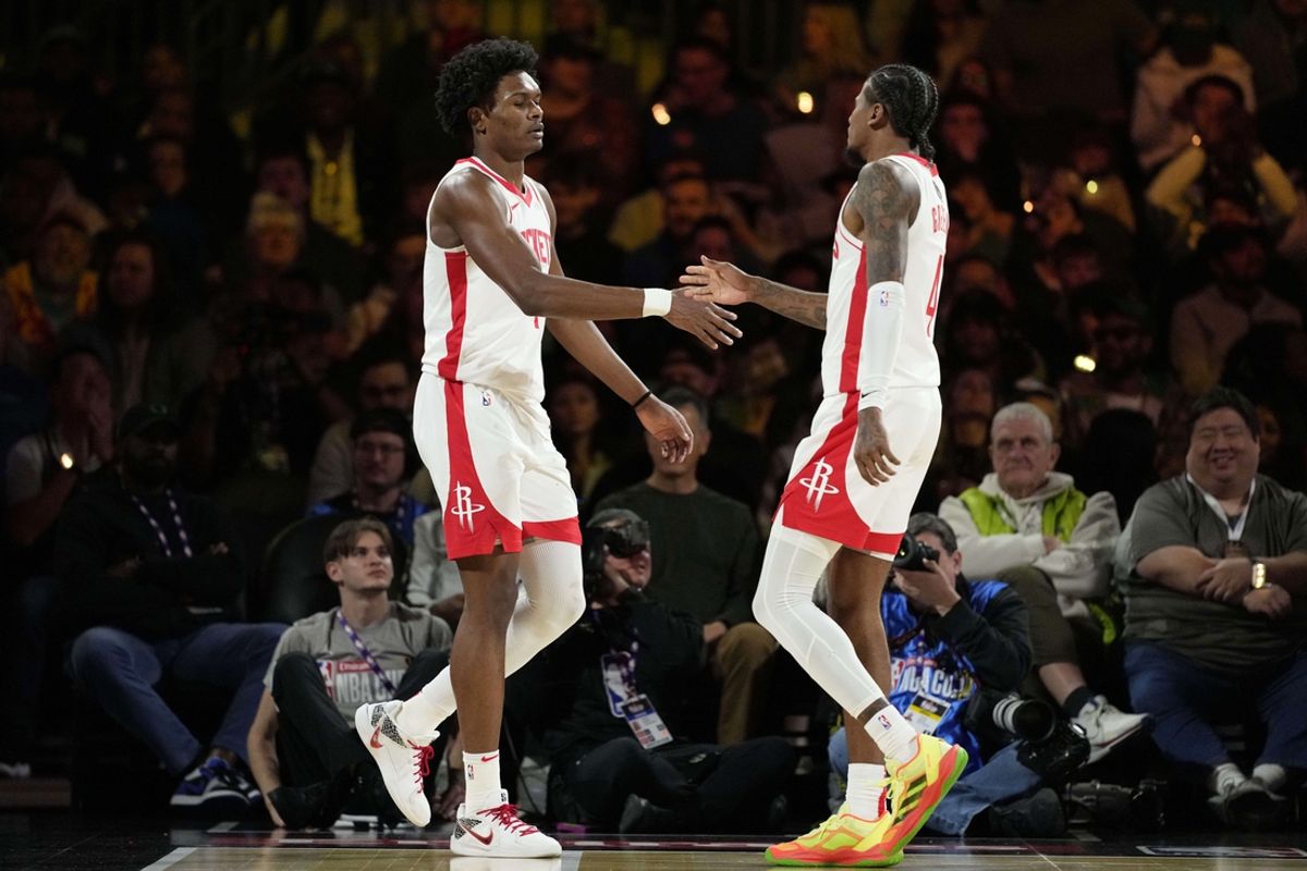 Dec 14, 2024; Las Vegas, Nevada, USA; Houston Rockets forward Amen Thompson (1) and guard Jalen Green (4) react during the second quarter against the Oklahoma City Thunder in a semifinal of the 2024 Emirates NBA Cup at T-Mobile Arena. Mandatory Credit: Kyle Terada-Imagn Images