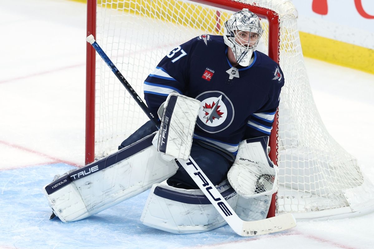 Dec 14, 2024; Winnipeg, Manitoba, CAN; Winnipeg Jets goaltender Connor Hellebuyck (37) watches the play in the third period against the Montreal Canadiens at Canada Life Centre. Mandatory Credit: James Carey Lauder-Imagn Images