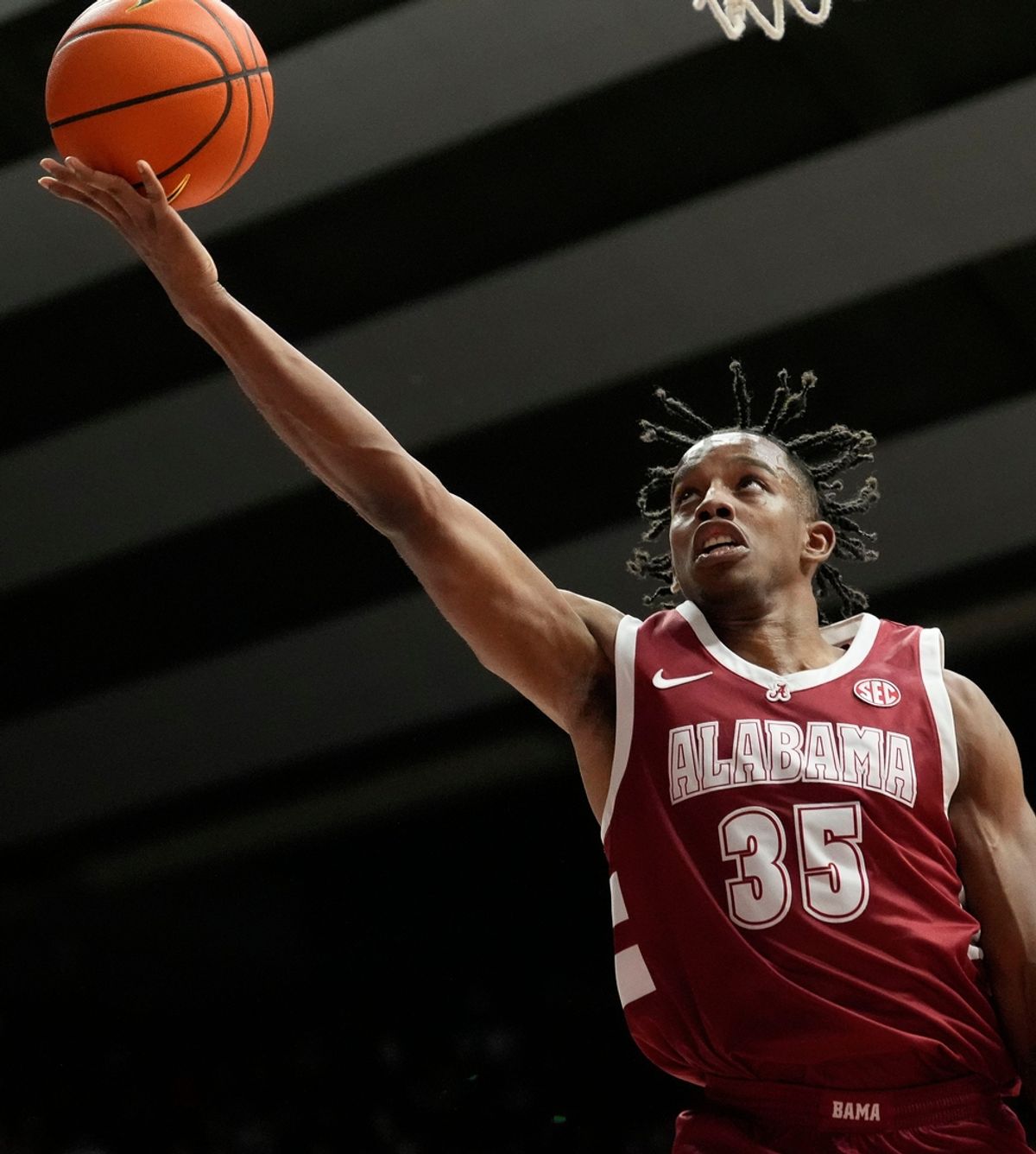 Dec 14, 2024; Tuscaloosa, AL, USA; Alabama forward Derrion Reid (35) scores in the lane at Coleman Coliseum. Alabama defeated Creighton 83-75. Mandatory Credit: Gary Cosby Jr.-Tuscaloosa News