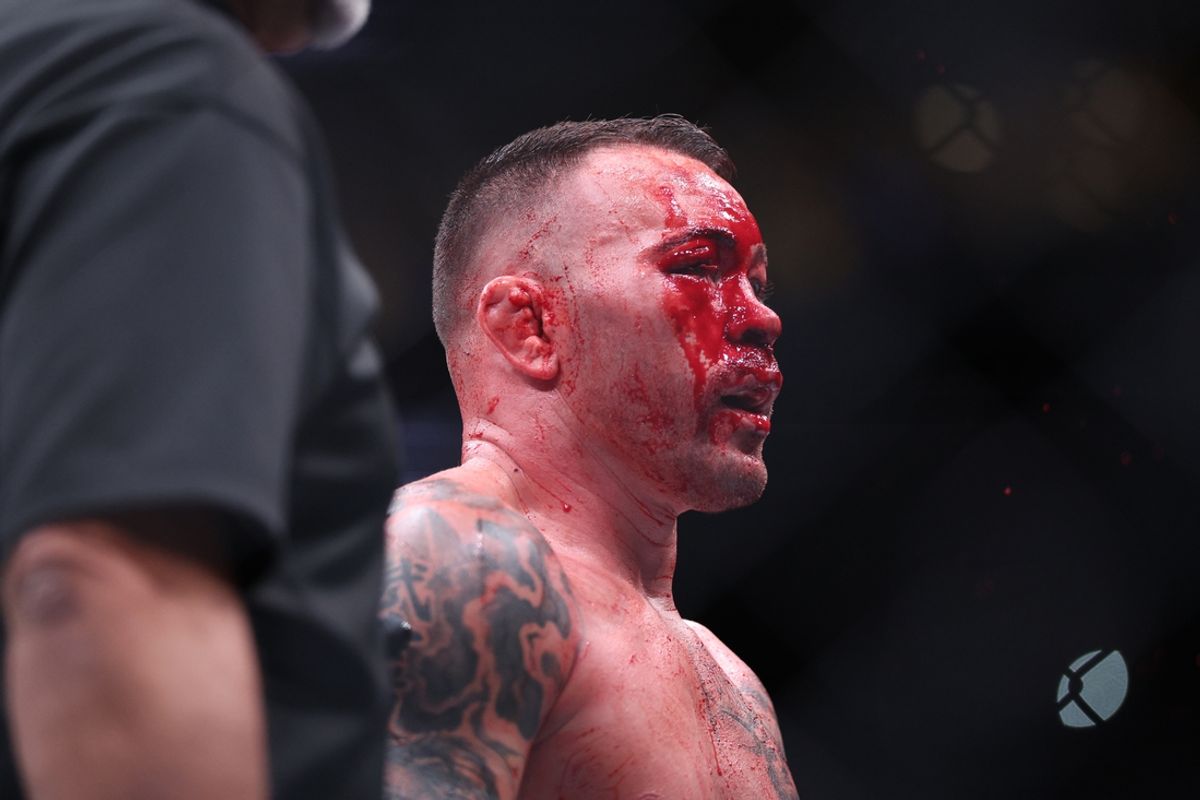 Dec 14, 2024; Tampa, Florida, UNITED STATES;  Colby Covington (red gloves) reacts after the fight against Joaquin Buckley (blue gloves) at Amalie Arena. Mandatory Credit: Nathan Ray Seebeck-Imagn Images