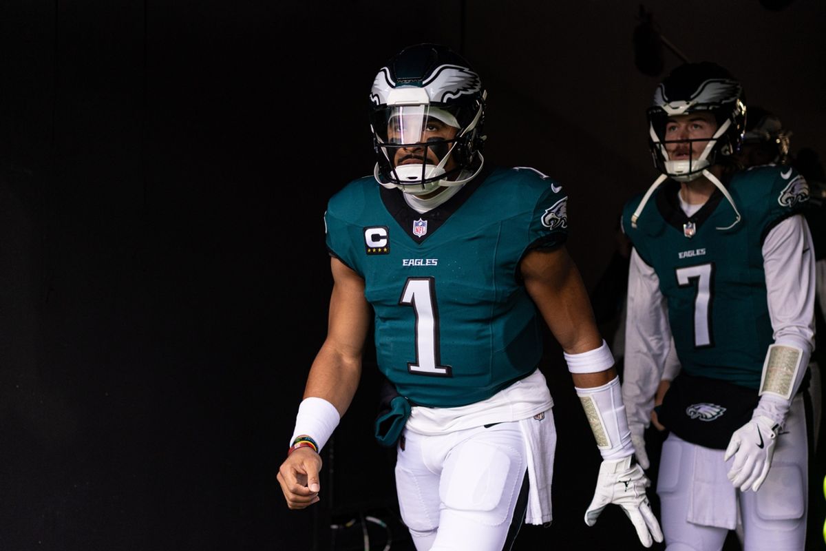 Dec 15, 2024; Philadelphia, Pennsylvania, USA; Philadelphia Eagles quarterback Jalen Hurts (1) and quarterback Kenny Pickett (7) take the field for warm ups against the Pittsburgh Steelers at Lincoln Financial Field. Mandatory Credit: Bill Streicher-Imagn Images
