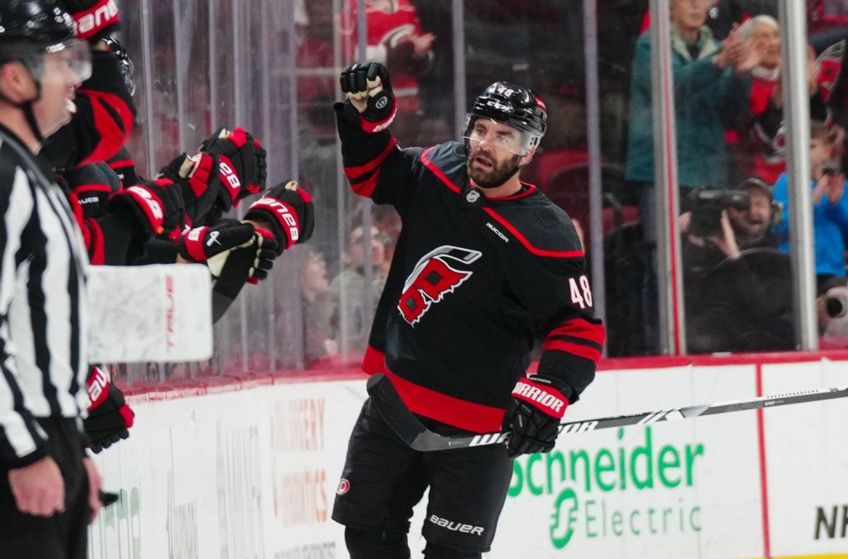 Dec 15, 2024; Raleigh, North Carolina, USA;  Carolina Hurricanes left wing Jordan Martinook (48) celebrates his goal against the Columbus Blue Jackets during the second period at Lenovo Center. Mandatory Credit: James Guillory-Imagn Images