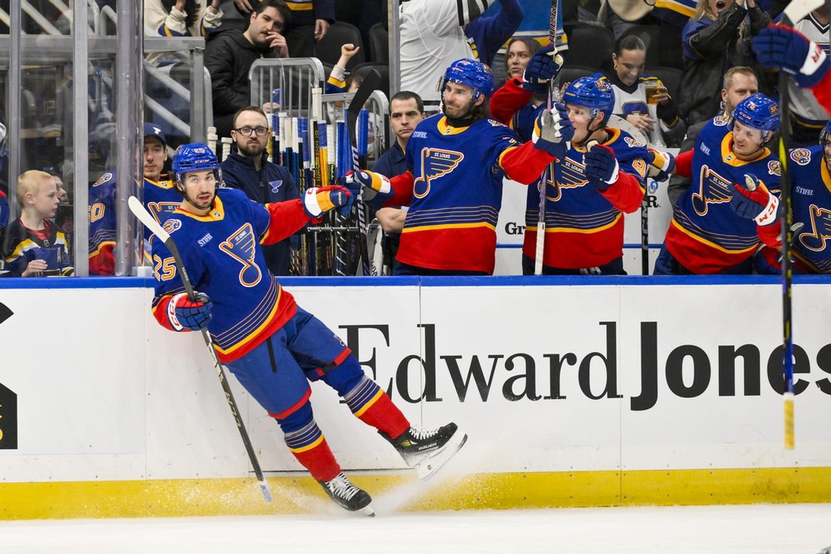 Dec 15, 2024; St. Louis, Missouri, USA;  St. Louis Blues center Jordan Kyrou (25) celebrates after scoring against the New York Rangers during the second period at Enterprise Center. Mandatory Credit: Jeff Curry-Imagn Images