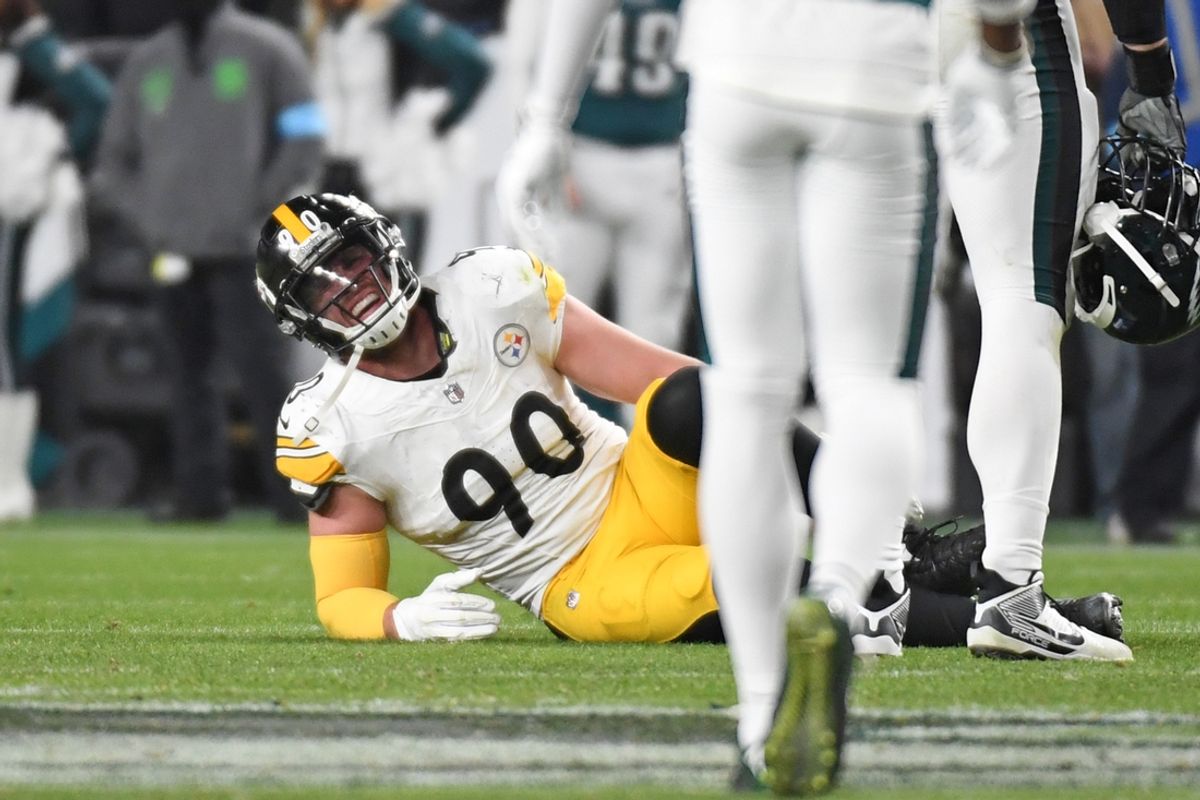 Dec 15, 2024; Philadelphia, Pennsylvania, USA; Pittsburgh Steelers linebacker T.J. Watt (90) grimaces in pain as during the fourth quarter against the Philadelphia Eagles at Lincoln Financial Field. Mandatory Credit: Eric Hartline-Imagn Images