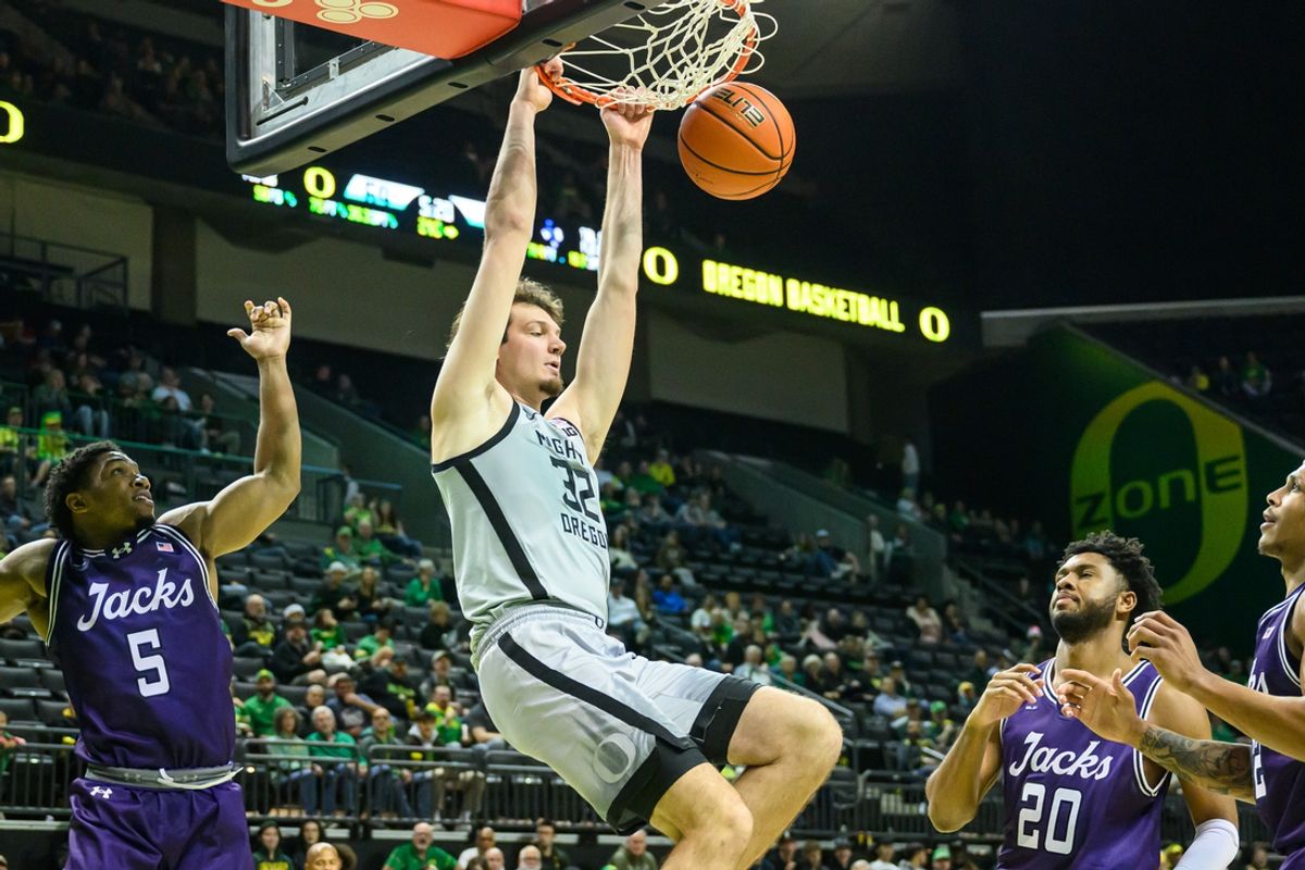 Dec 15, 2024; Eugene, Oregon, USA; Oregon Ducks center Nate Bittle (32) dunks the ball during the second half against the Stephen F. Austin Lumberjacks at Matthew Knight Arena. Mandatory Credit: Craig Strobeck-Imagn Images