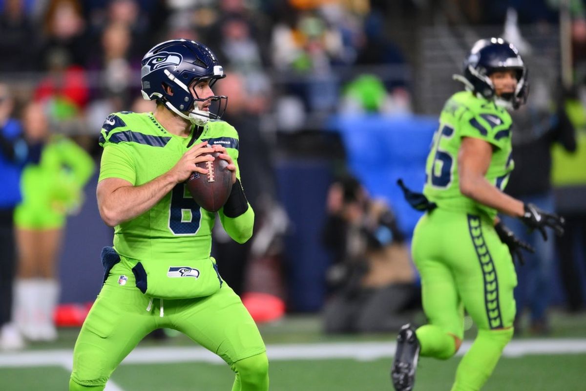 Dec 15, 2024; Seattle, Washington, USA; Seattle Seahawks quarterback Sam Howell (6) looks to pass the ball against the Green Bay Packers during the second half at Lumen Field. Mandatory Credit: Steven Bisig-Imagn Images