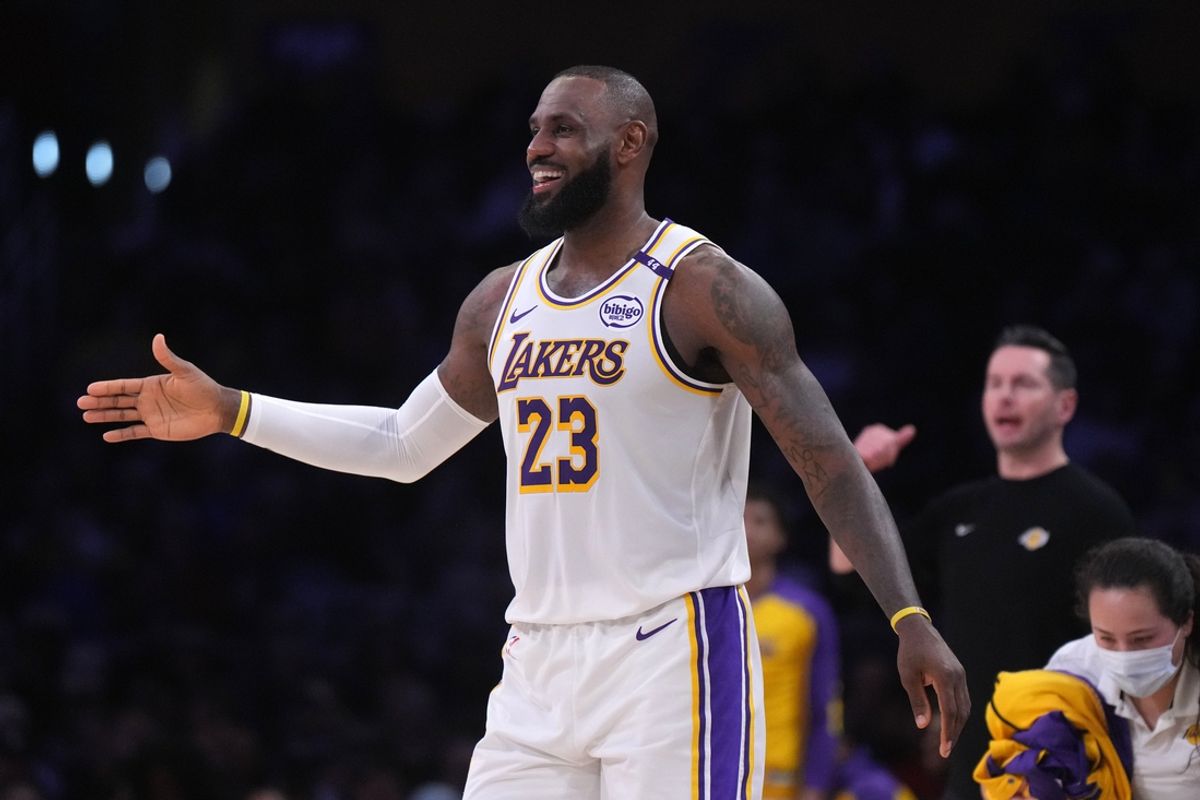 Dec 15, 2024; Los Angeles, California, USA; Los Angeles Lakers forward LeBron James (23) reacts in the first half against the Memphis Grizzlies at Crypto.com Arena. Mandatory Credit: Kirby Lee-Imagn Images