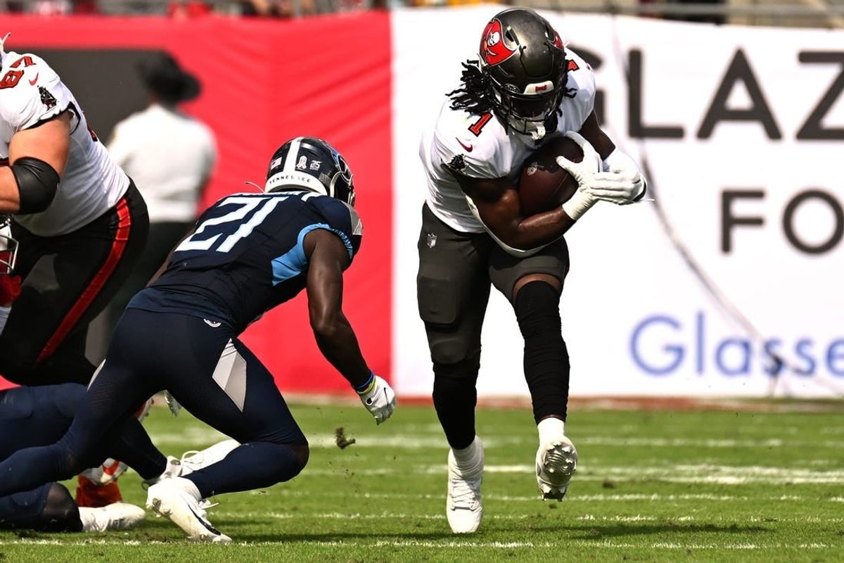 Nov 12, 2023; Tampa, Florida, USA; Tampa Bay Buccaneers running back Rachaad White (1) runs the ball in the first half against the Tennessee Titans at Raymond James Stadium.