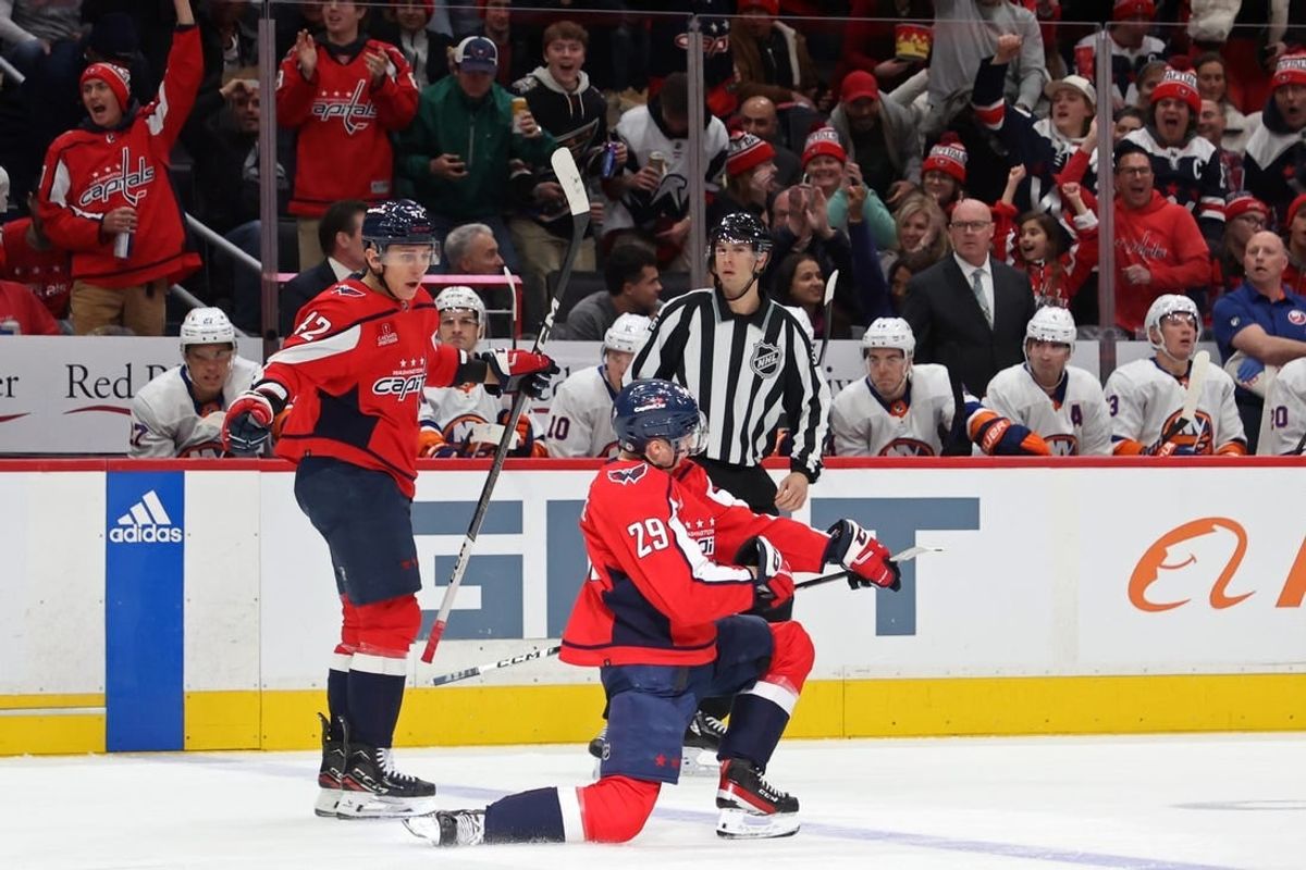 Dec 20, 2023; Washington, District of Columbia, USA; Washington Capitals center Hendrix Lapierre (29) celebrates after scoring a goal against the New York Islanders in the first period at Capital One Arena.
