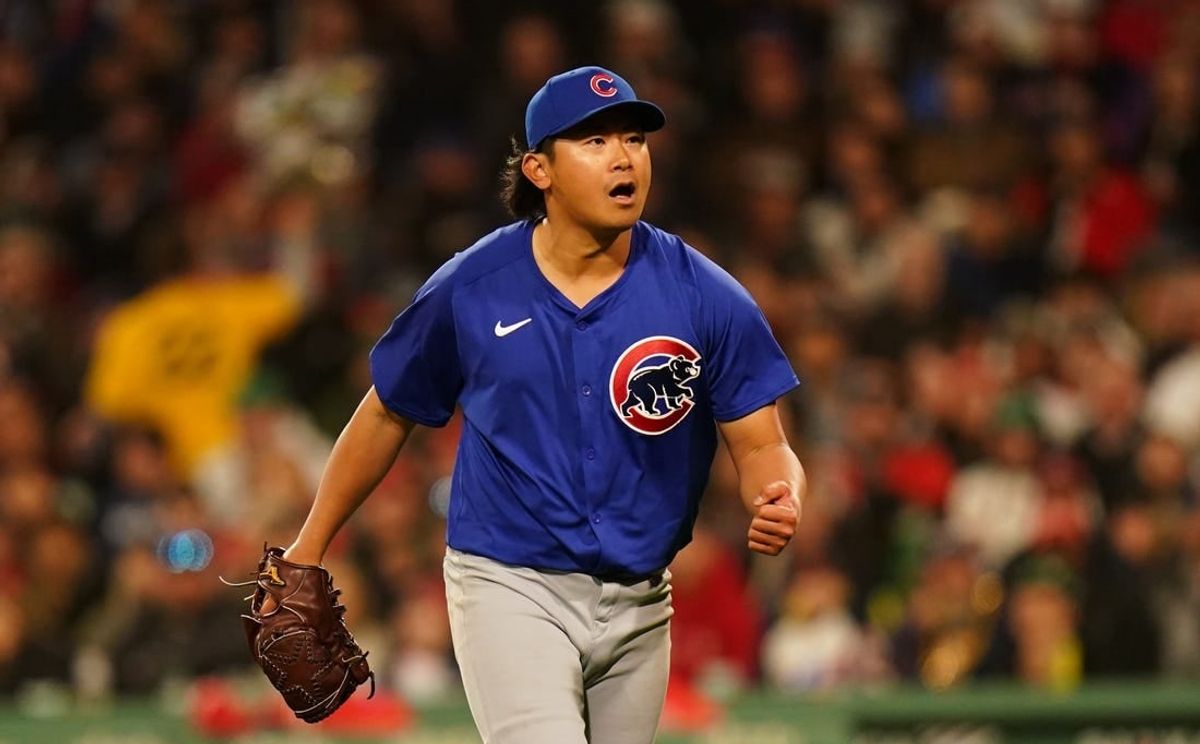 Apr 26, 2024; Boston, Massachusetts, USA; Chicago Cubs starting pitcher Shota Imanaga (18) reacts after ending the sixth inning against the Boston Red Sox at Fenway Park.