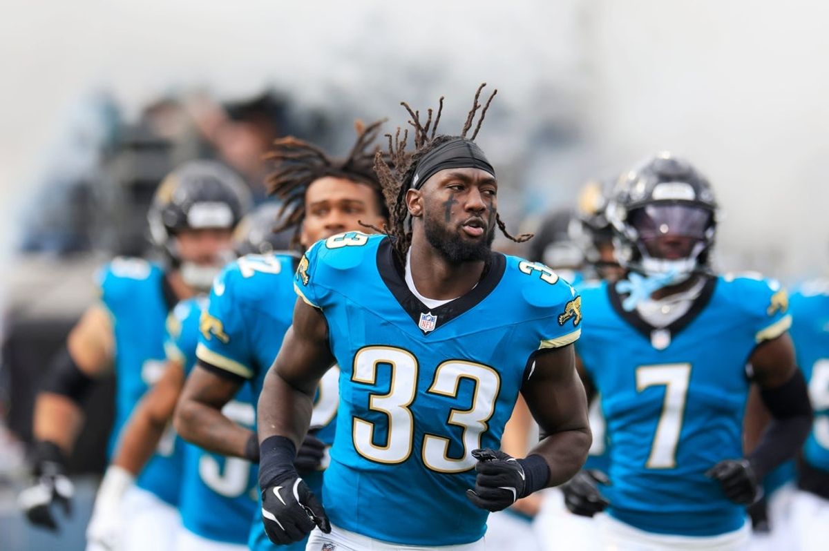 Jacksonville Jaguars linebacker Devin Lloyd (33) runs on the field before an NFL football matchup Sunday, Dec. 15, 2024 at EverBank Stadium in Jacksonville, Fla. [Corey Perrine/Florida Times-Union]
