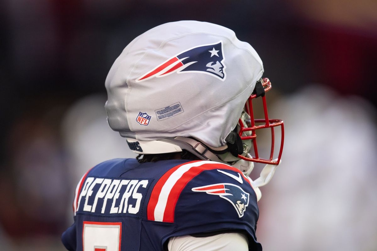 Dec 15, 2024; Glendale, Arizona, USA; Detailed view of the guardian cap on the helmet of New England Patriots safety Jabrill Peppers (5) against the Arizona Cardinals at State Farm Stadium. Mandatory Credit: Mark J. Rebilas-Imagn Images