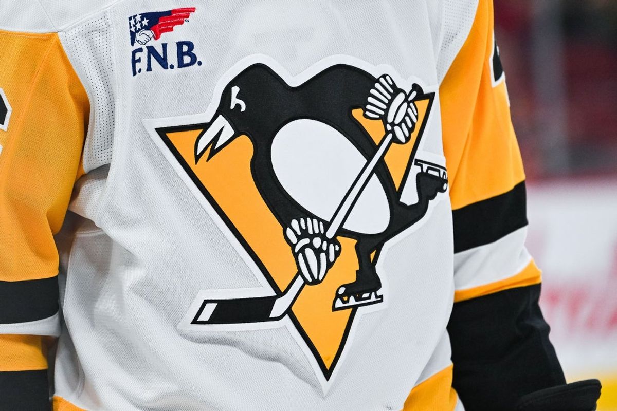 Dec 12, 2024; Montreal, Quebec, CAN; View of a Pittsburgh Penguins logo on a jersey worn by a member of the team during the second period at Bell Centre. Mandatory Credit: David Kirouac-Imagn Images