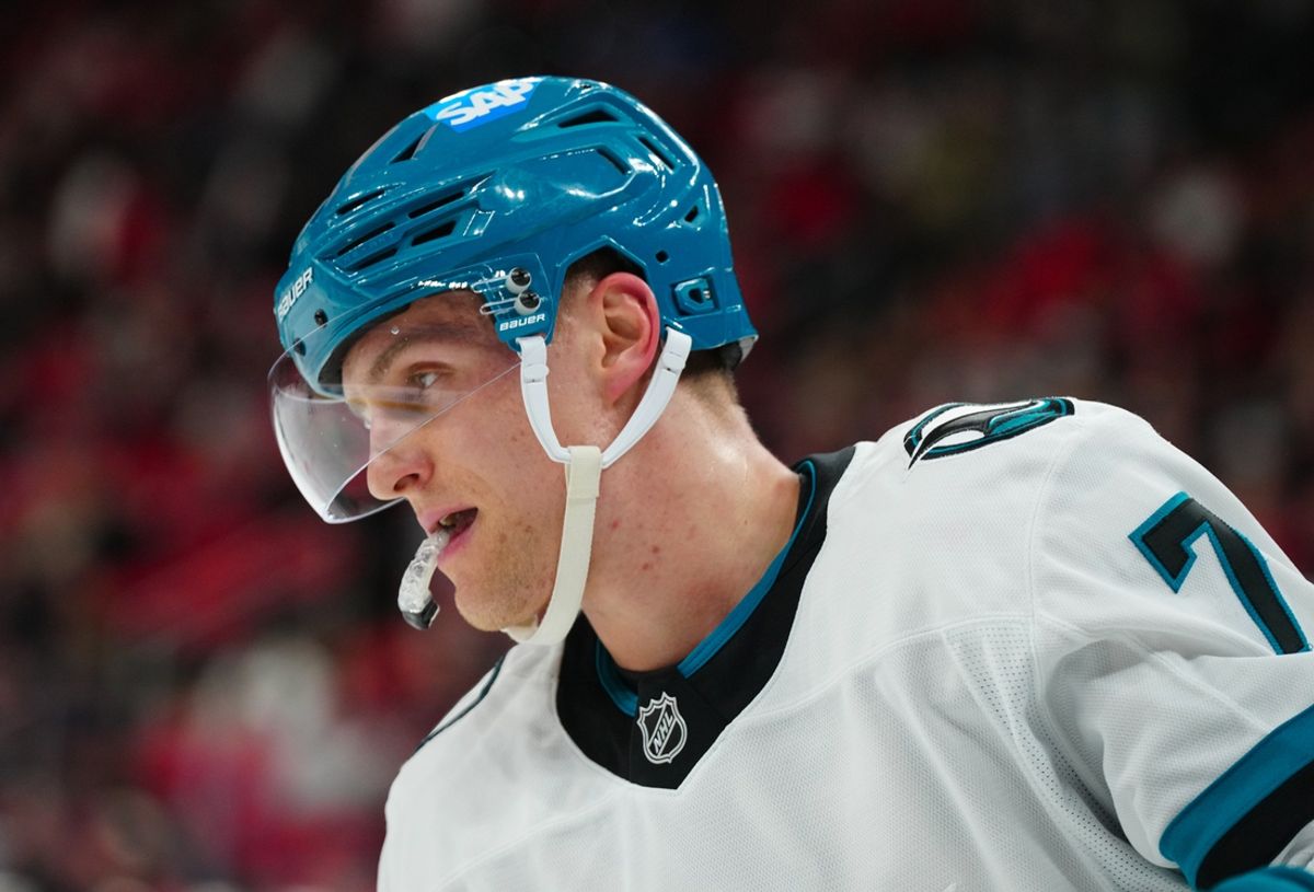 Dec 10, 2024; Raleigh, North Carolina, USA;  San Jose Sharks center Nico Sturm (7) looks on against the Carolina Hurricanes during the first period at Lenovo Center. Mandatory Credit: James Guillory-Imagn Images