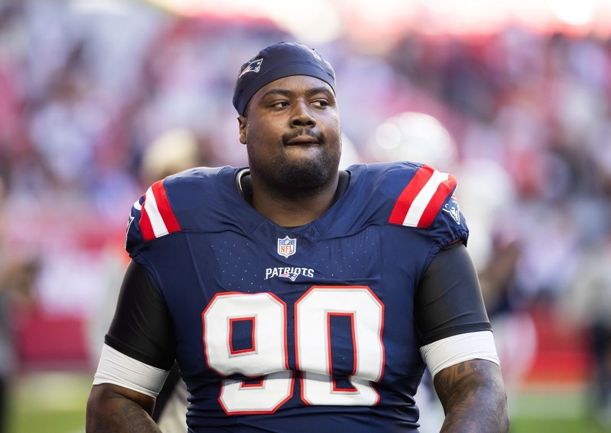 Dec 15, 2024; Glendale, Arizona, USA; New England Patriots defensive tackle Christian Barmore (90) against the Arizona Cardinals at State Farm Stadium. Mandatory Credit: Mark J. Rebilas-Imagn Images