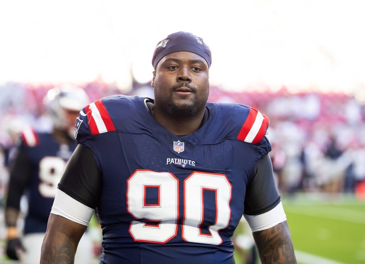 Dec 15, 2024; Glendale, Arizona, USA; New England Patriots defensive tackle Christian Barmore (90) against the Arizona Cardinals at State Farm Stadium. Mandatory Credit: Mark J. Rebilas-Imagn Images
