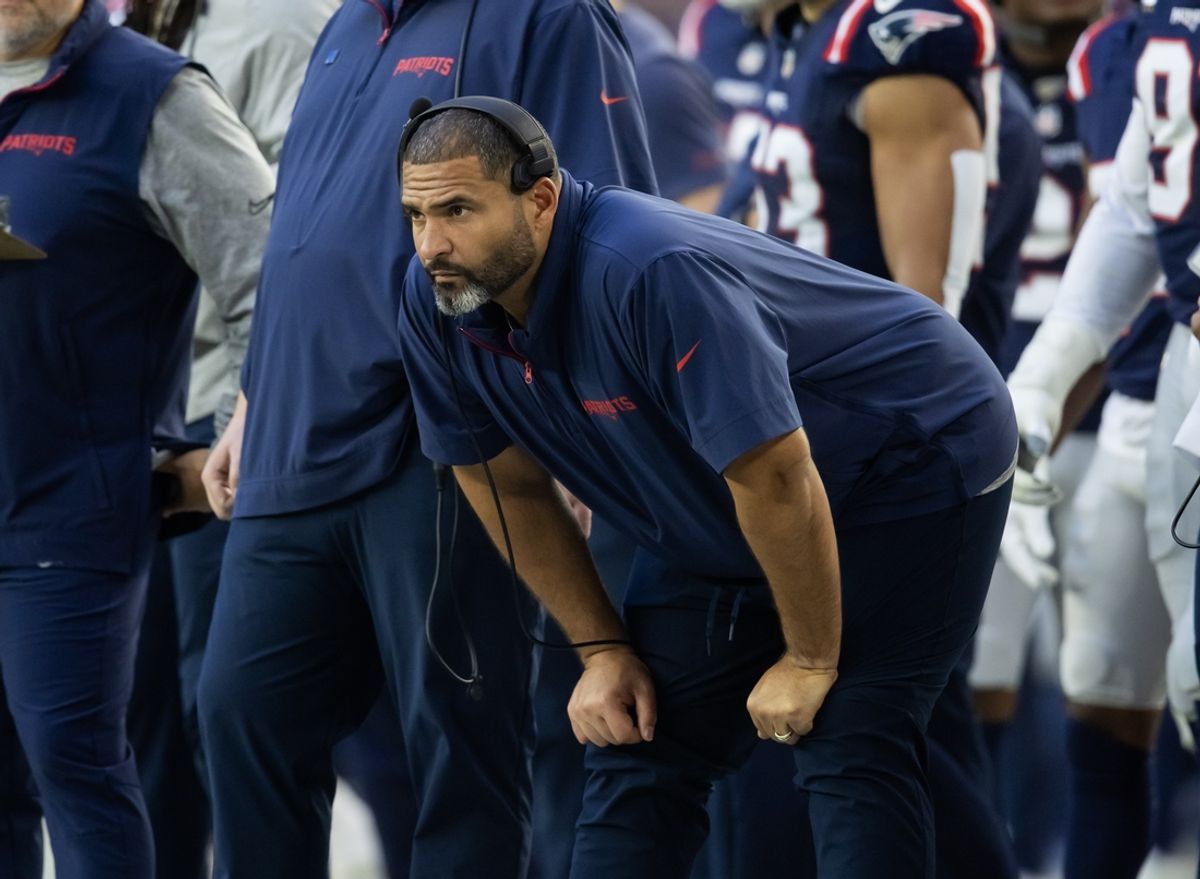 Dec 15, 2024; Glendale, Arizona, USA; New England Patriots defensive line coach Jerry Montgomery against the Arizona Cardinals at State Farm Stadium. Mandatory Credit: Mark J. Rebilas-Imagn Images