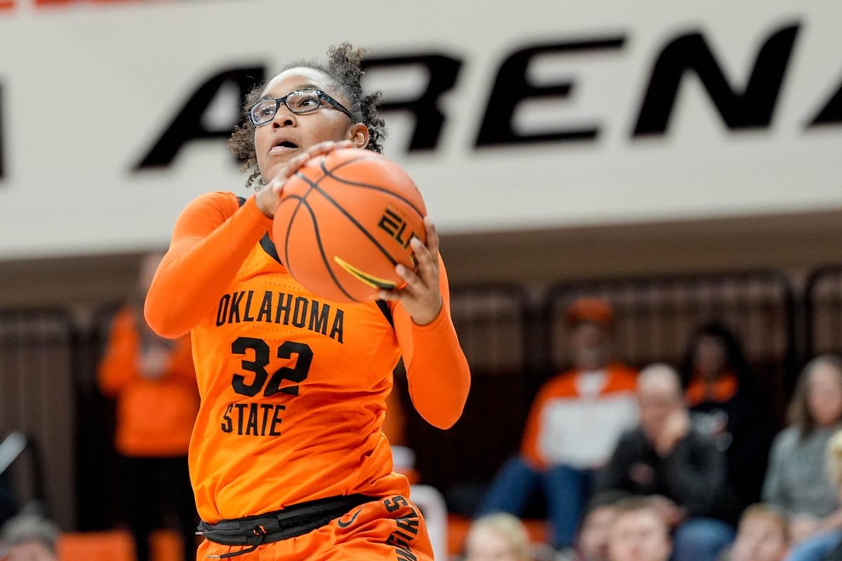Oklahoma State guard Stailee Heard (32) catches a pass from across the court and lays up the ball in the fourth quarter during an NCAA women’s basketball game between Oklahoma State and McNeese at Gallagher-Iba Arena in Stillwater, Okla., on Monday, Dec. 16, 2024.