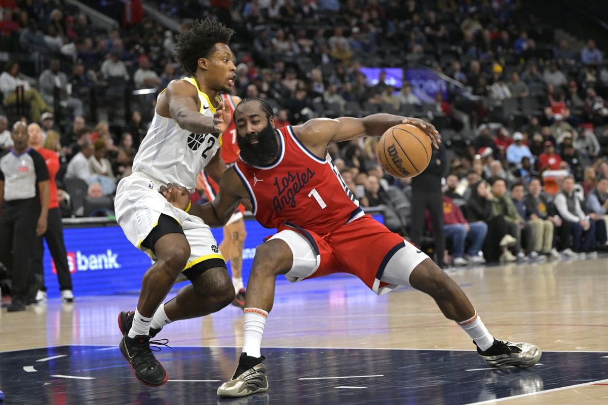 Dec 16, 2024; Inglewood, California, USA;  Los Angeles Clippers guard James Harden (1) is defended by Utah Jazz guard Collin Sexton (2) in the second half at Intuit Dome. Mandatory Credit: Jayne Kamin-Oncea-Imagn Images