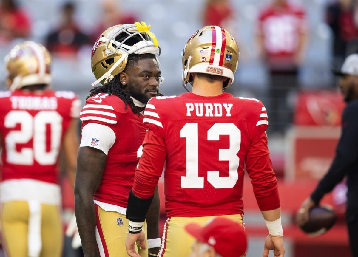 Dec 17, 2023; Glendale, Arizona, USA; San Francisco 49ers quarterback Brock Purdy (13) with wide receiver Brandon Aiyuk (11) against the Arizona Cardinals at State Farm Stadium. Mandatory Credit: Mark J. Rebilas-USA TODAY Sports
