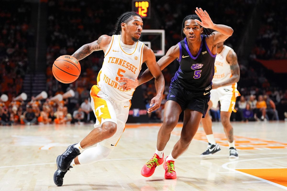 Tennessee guard Zakai Zeigler (5) moves past Western Carolina guard Brandon Morgan (5) during a college basketball game between Tennessee and Western Carolina held at Thompson-Boling Arena at Food City Center in Knoxville, Tenn., on Tuesday, Dec. 17, 2024.