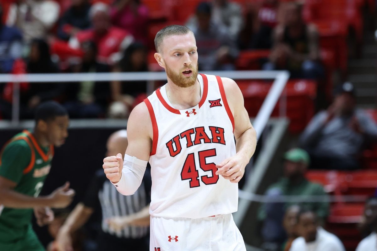 Dec 17, 2024; Salt Lake City, Utah, USA; Utah Utes guard Mason Madsen (45) reacts to a three point shot against the Florida A&M Rattlers during the first half at Jon M. Huntsman Center. Mandatory Credit: Rob Gray-Imagn Images