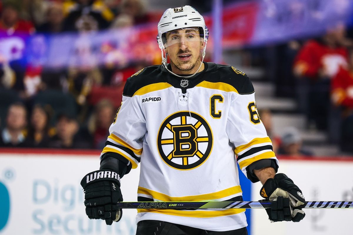 Dec 17, 2024; Calgary, Alberta, CAN; Boston Bruins left wing Brad Marchand (63) during the third period against the Calgary Flames at Scotiabank Saddledome. Mandatory Credit: Sergei Belski-Imagn Images