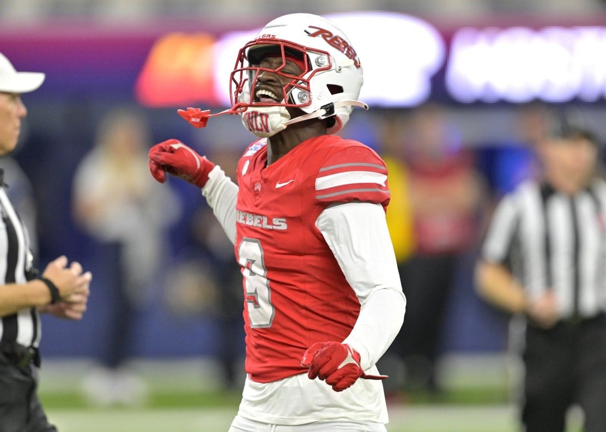 Dec 18, 2024; Inglewood, CA, USA;     UNLV Rebels defensive back Jett Elad (9)celebrates after a play in the first half against the California Golden Bears at SoFi Stadium. Mandatory Credit: Jayne Kamin-Oncea-Imagn Images