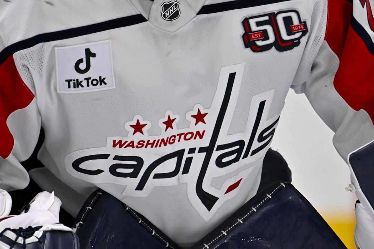 Dec 16, 2024; Dallas, Texas, USA; A view of the Capitals logo on the jersey of Washington Capitals goaltender Charlie Lindgren (79) during the game between the Dallas Stars and the Washington Capitals at American Airlines Center. Mandatory Credit: Jerome Miron-Imagn Images